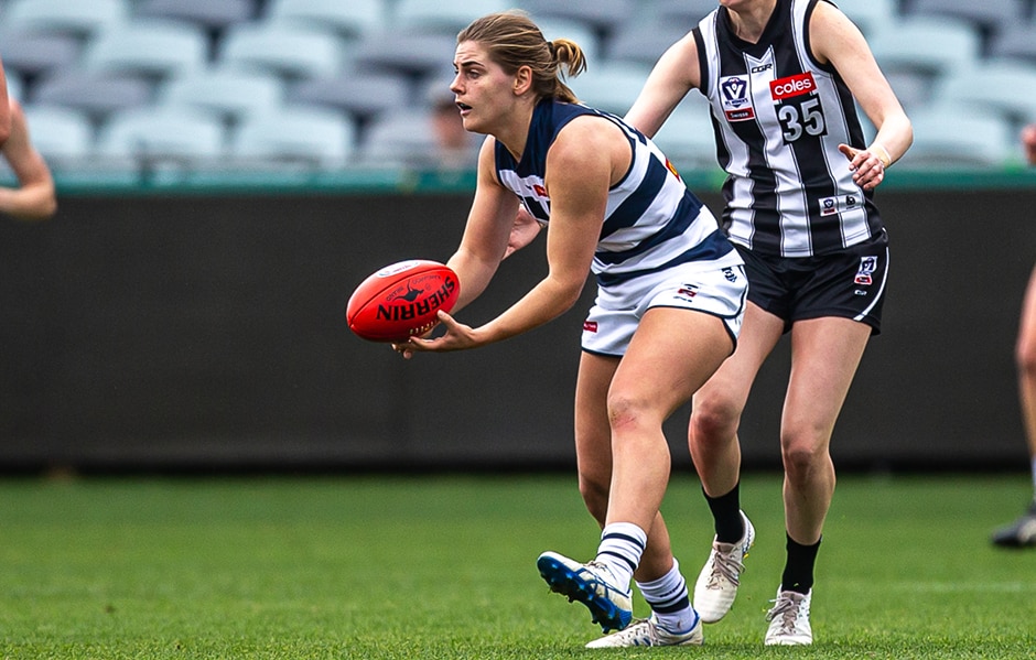 2019_05_26_VFLW_HERO.png Maddy Keryk fires off a handball against the Pies. - Geelong Cats